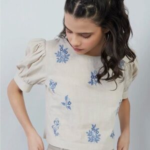 Chic Beige Blouse with Blue Floral Design